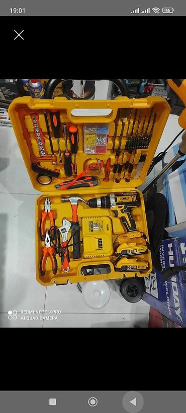dewalt drel: Çoxfunksiyalı alət dəsti – sarı rəngli möhkəm plastik çamadan içində — 1
