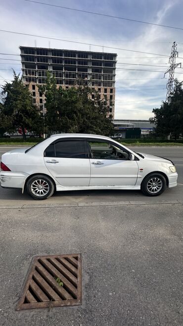 Mitsubishi: Mitsubishi Lancer: 2001 г., 1.8 л, Вариатор, Бензин, Седан