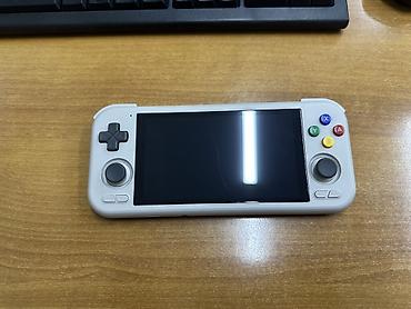 sony plastatyon: Портативная игровая консоль Retroid Pocket 4 (серый цвет) - Встроенная — 3