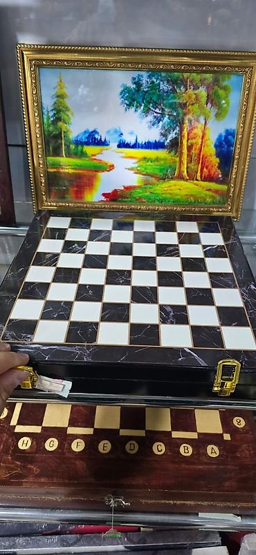 Çantalar: Metal fiqurlu şahmat dəsti.qiymetler ferqlidir.35 AZN-dən — 2