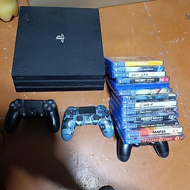 швей машинка: PlayStation 4 Pro (черная) + 2 геймпада DualShock 4 + набор дисков ИЛИ — 1