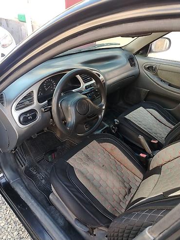 Daewoo: Daewoo Nexia: 1.3 l | 2010 il Sedan — 7