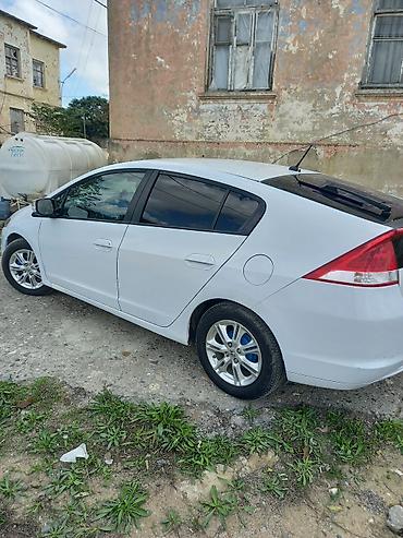 qara disk: Honda Insight hibrid hetçbek - Kuzov: hetçbek, ağ rəng - Yanacaq — 2