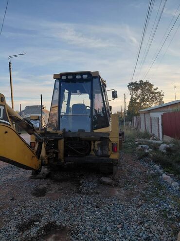 купить экскаватор погрузчик: Экскаватор, Caterpillar, 2000 г., Колесный