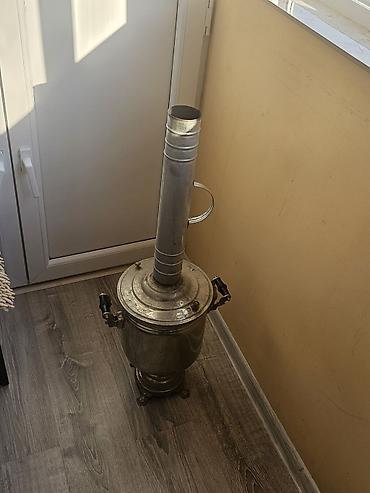 samovar tarixi: Kömür/odunla işləyən metal samovar. 3-4 dəfə işlənib. 5 litr su — 5