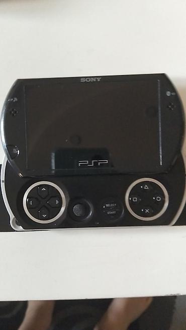 plastation klub: Psp Go ideal vəziyyətdə, original reklamı var,11 oyun var: Agent 007 — 4