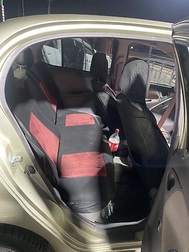 kia 1 5: Toyota Platz: 2000 г., 1.3 л, Автомат, Бензин, Седан — 10