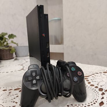 plesdesin: PlayStation 2 SÜPER SLIM problemsiz 1 orjinal pult və lazimi