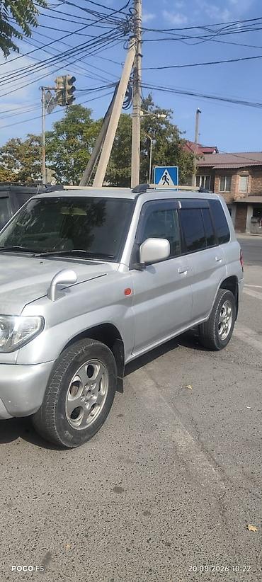 трёхдверный: Mitsubishi Pajero iO: 2001 г., 0.2 л, Автомат, Бензин, Внедорожник — 1