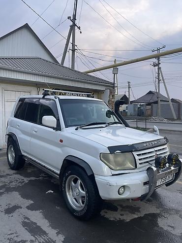 бампер задний е34: Mitsubishi Pajero iO: 1999 г., 1.8 л, Автомат, Бензин, Внедорожник — 1