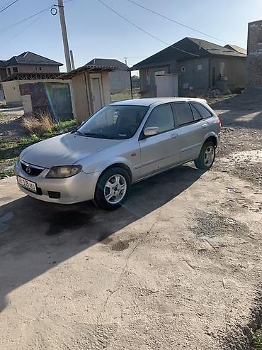 стекло на одиссей: Mazda 323: 2003 г., Механика, Бензин, Универсал — 1