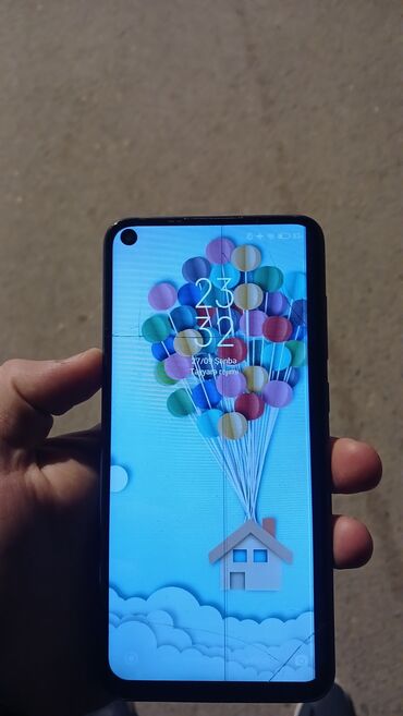 xiomi civi 1: Redmi M2003J15SG smartfonu. Cihazın arxa tərəfində kvadrat formalı