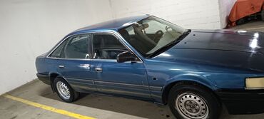 боковой тырмоо: Mazda 626: 1988 г., 2 л, Механика, Бензин, Хетчбек