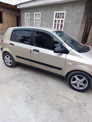 зид 4 5: Hyundai Getz: 2005 г., 1.4 л, Механика, Бензин, Хэтчбэк — 2