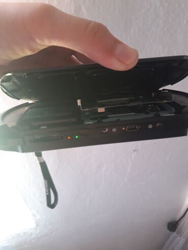 ремонт телевизор ош: Портативная игровая консоль Sony PSP черного цвета. Устройство имеет