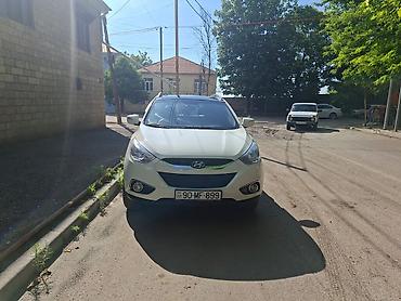 hyundai ıx35: Hyundai ix35, ağ rəng, 4WD (tam ötürücülü) krossover. Xüsusiyyətlər — 1