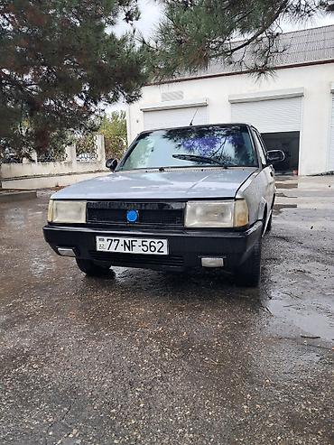 ucuz tofaş: Marka/model: Tofas (Sedan) Kuzov: 4 qapılı sedan, gümüşü rəng Ön və — 5