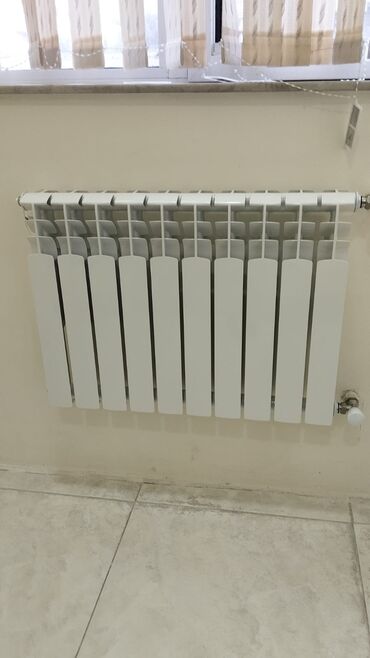 seksiyalı radiator: Radiatorlar satilir. Umumi 57 seksiyadir. Bir seksiya 7 azn. Unvan 3cu