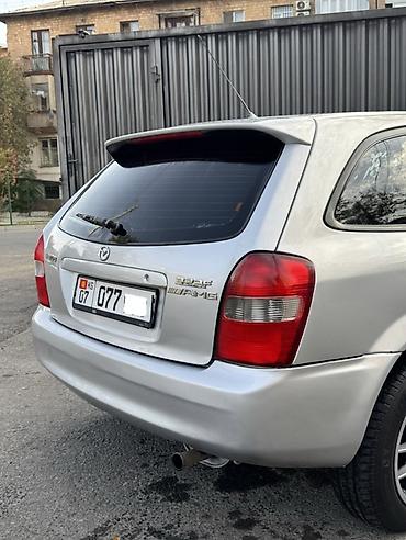 rexton j4: Mazda Familia: 2002 г., 1.6 л, Механика, Бензин, Хэтчбэк — 7