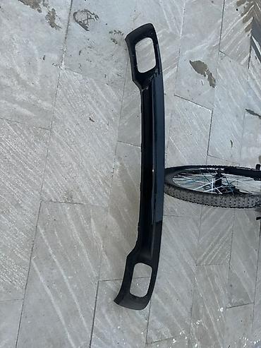 masin opel: BMW F01 (7 Series) arxa bamper üçün alt qara moldinq/triminq hissəsi — 1