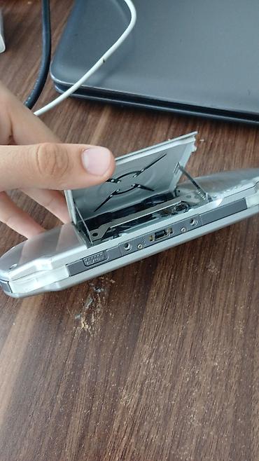 nintendo switch ikinci el: Sony PSP portativ oyun konsolu – gümüş rəng Xüsusiyyətlər: - 4.3 düym — 3