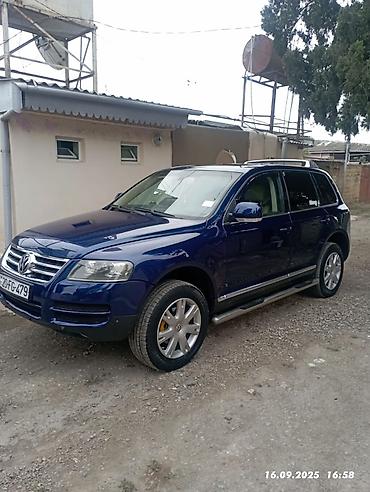 011 sekilleri: Volkswagen Touareg: 3.2 l | 2006 il Universal — 2