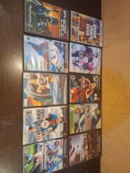 ps5 controller qiymeti: PlayStation 2 oyunlarin qutusulari. Sadece qutusulardi, icinde OYUN