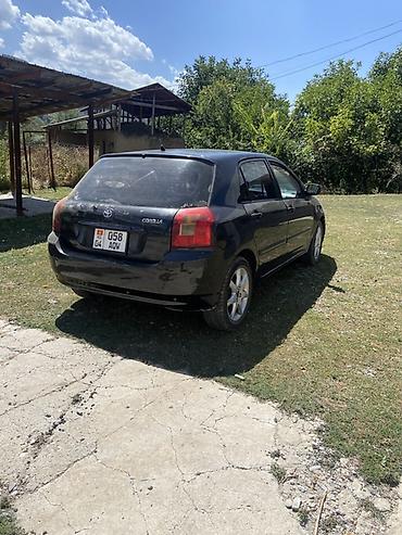 rota grid: Toyota Corolla: 2002 г., 1.6 л, Механика, Бензин, Хэтчбэк — 2