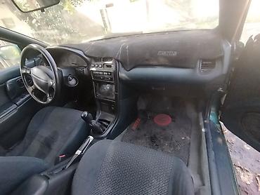 кызыл кия манипулятор: Mazda 323: 1995 г., 1.8 л, Кол менен иштөөчү, Бензин, Седан — 10