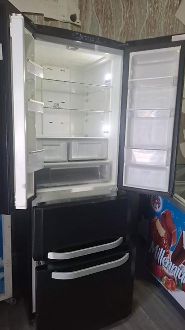 Mətbəx texnikası: Hotpoint Ariston markalı çoxqapılı soyuducu. Qara rəngli, müasir və — 2