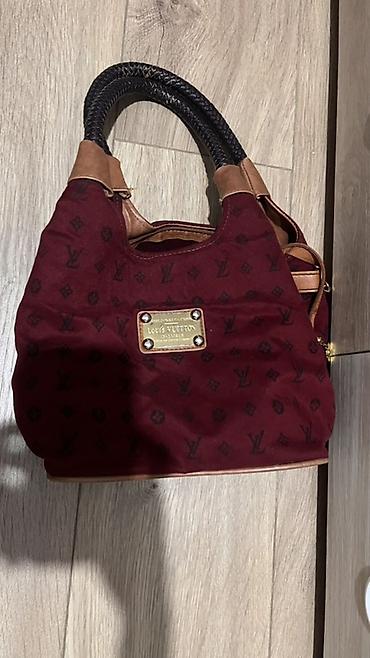 louis: Сумка Louis Vuitton(скорее всего реплика)бордовая,дырка внутри, чуть — 1