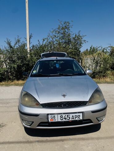 продаю или меняю на дом: Автомобиль Ford Focus серебристого цвета с номерными знаками