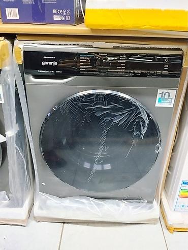 Стиральная машина Gorenje фронтальной загрузки в сером цвете