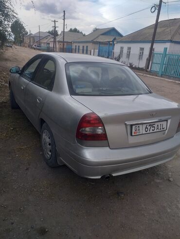 машина некся: Daewoo Nubira: 1999 г., 1.6 л, Механика, Бензин, Седан