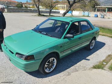 Sale cars: Mazda 323: 1.6 l | 1992 year Limousine
