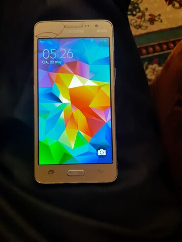 10 manata telefonlar: Samsung Galaxy Grand 2, 8 GB, rəng - Gümüşü, Düyməli