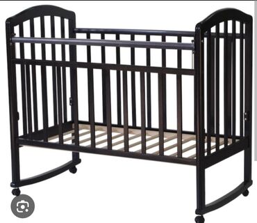 3 лет: Продается такой деревянный манеж но без колес, у нас разобранно (фото