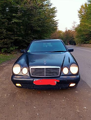 bakida traktor işi: Mercedes-Benz 230: 2.3 l | 1997 il Sedan — 4
