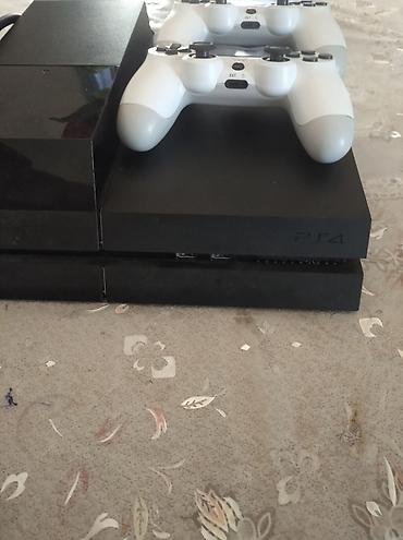 irşad iphone 11 pro: PlayStation 4 (PS4) oyun konsolu 2TB yaddaşı var prasifka modeldir — 6