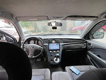 mitsubishi az: Mitsubishi Airtrek (Black) – şəhər və uzun yol üçün çox yönlü kompakt — 1