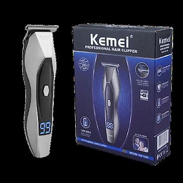 Бытовая техника: №: 12889 Məhsulun adı: Saç kəsimi üçün cihaz Kemei KM-1656 Brend — 4