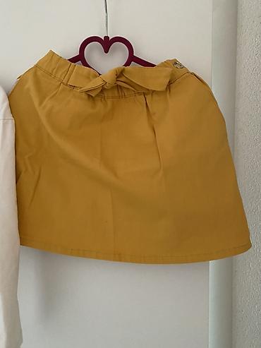 BEBA KIDS SUKNJICA Dečija suknja u senf/oker žutoj boji. - Model na lalafo.rs BEBA KIDS SUKNJICA Dečija suknja u senf/oker žutoj boji. - Model