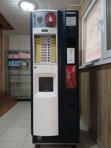 профессиональное кофейное оборудование: Кофейный автомат Saeco (вендинговый) Описание: - Напольный автомат с
