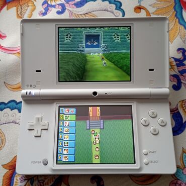 телефон fly ds: Nintendo DSI Nintendo DSI ideal vəziyyətdədir. Yaponiyadan zakaz