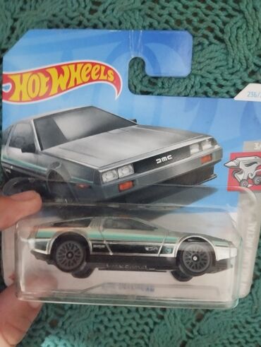 Игрушки: Продаю hotwheels TX делориан из за того что открытая и зайди чуть