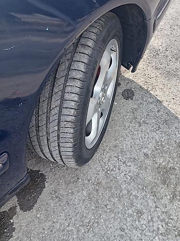 quba teker: Mercedes-Benz E-Class (W210) sedan - Kuzov: 4 qapılı sedan, tünd mavi — 8