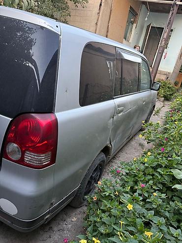 g comp: Mitsubishi Dion: 2004 г., Бензин — 2