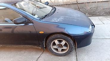 Mazda: Mazda 323: 1.5 l | 1996 г. Hečbek — 10