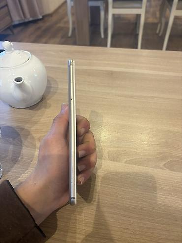 mi 4: Xiaomi Mi A2, 64 GB — 4