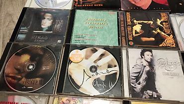 Другая аудиотехника: Продам свои б/у компакт диски, есть царапины на дисках, есть без — 14